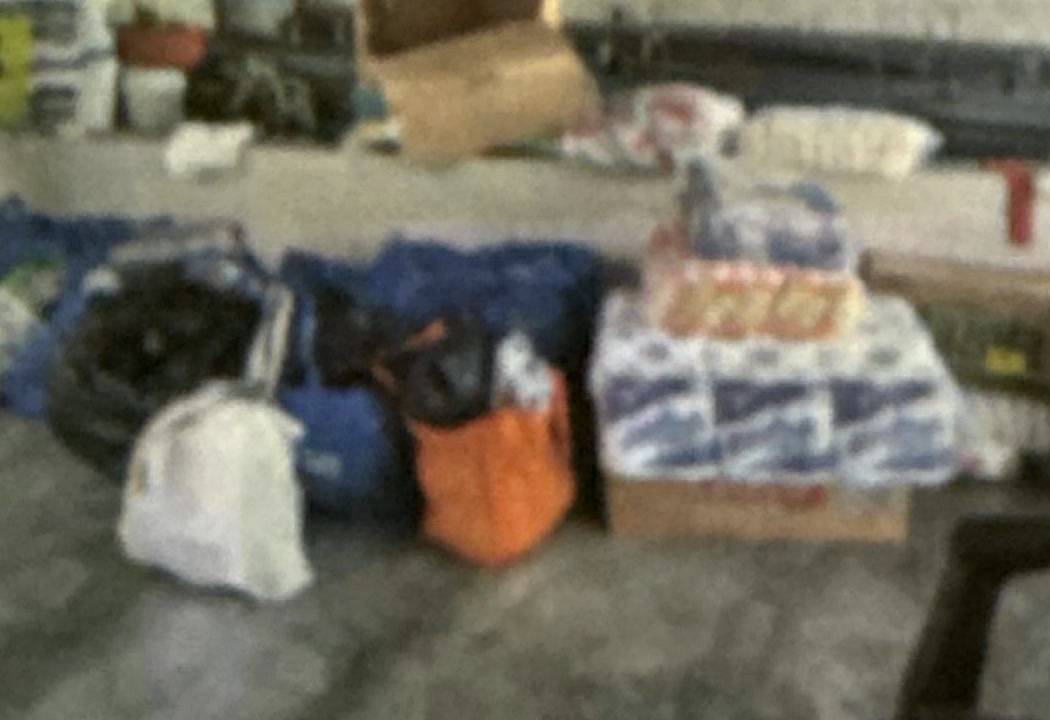 Boxes, bags, and practical supplies gathered for shipment to Honduras