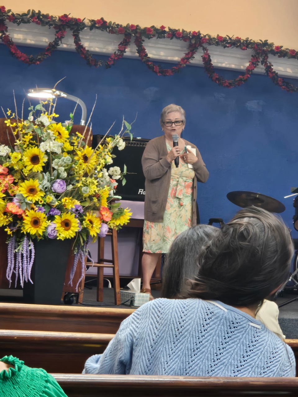Rosa speaking to a congregation