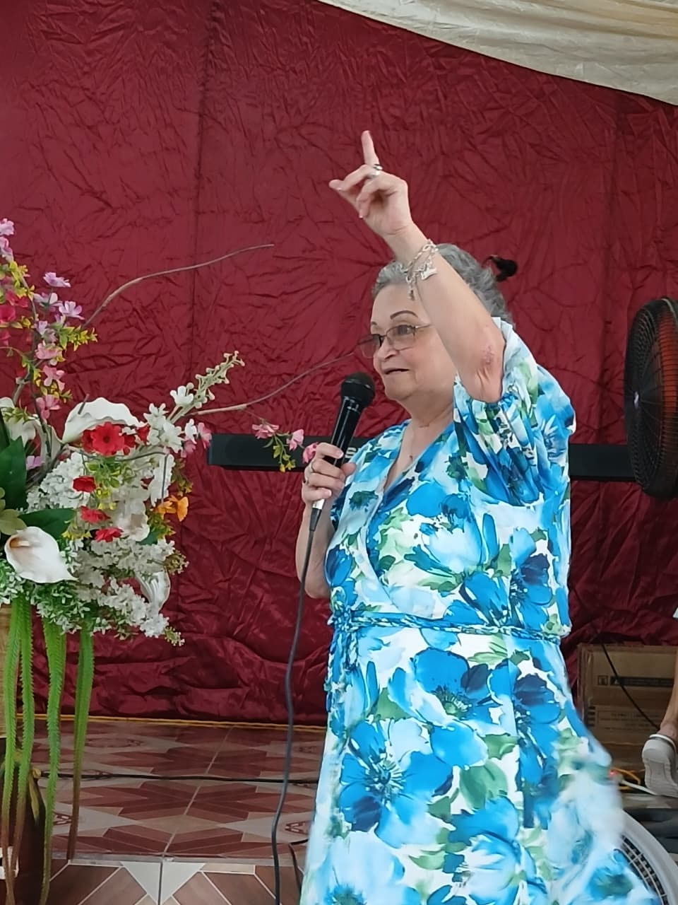 Rosa preaching at a women’s conference
